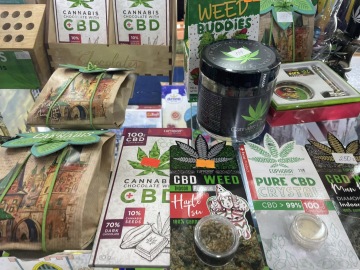 Alt text: Cannabis products advertised in a Prague weed shop