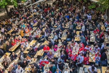 People enjoying drinks at Riegrovy Sady beer garden in Prague