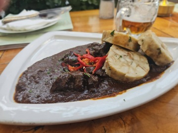 Traditional Czech beef goulash with bread dumplings served in a Prague pub