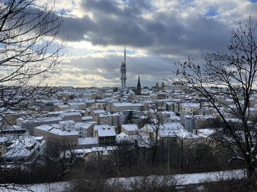 Panoramic winter view across Prague from Vítkov Hill near Hostel ELF
