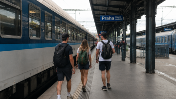 Backpackers taking a day trip by train from Prague