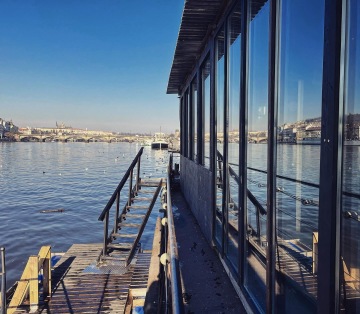 Finnish sauna on a boat at Náplavka overlooking Prague Castle and the Vltava