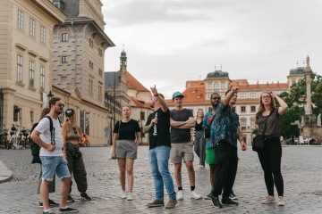 Backpackers on a walking tour in Prague